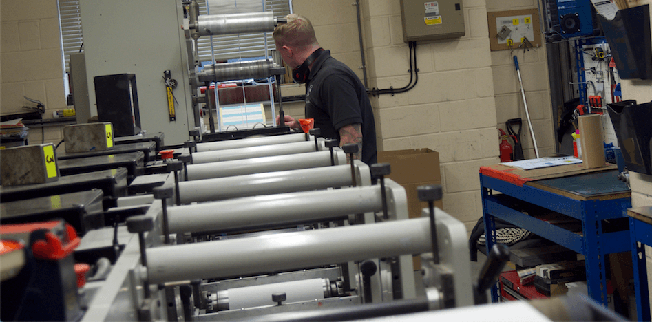 Man using Mark Andy Machine