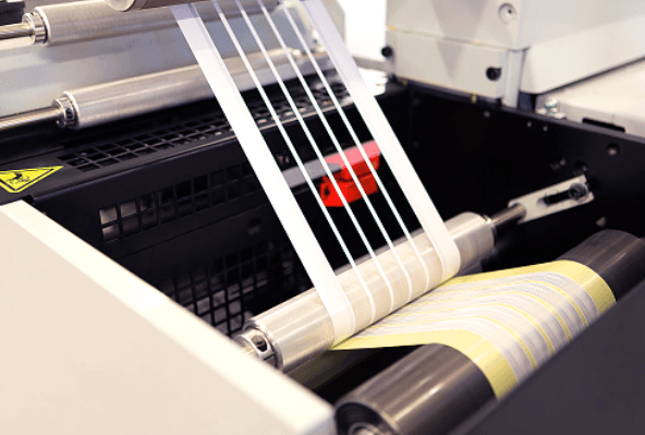 Self-Adhesive Labels being finished die cutting away the waste