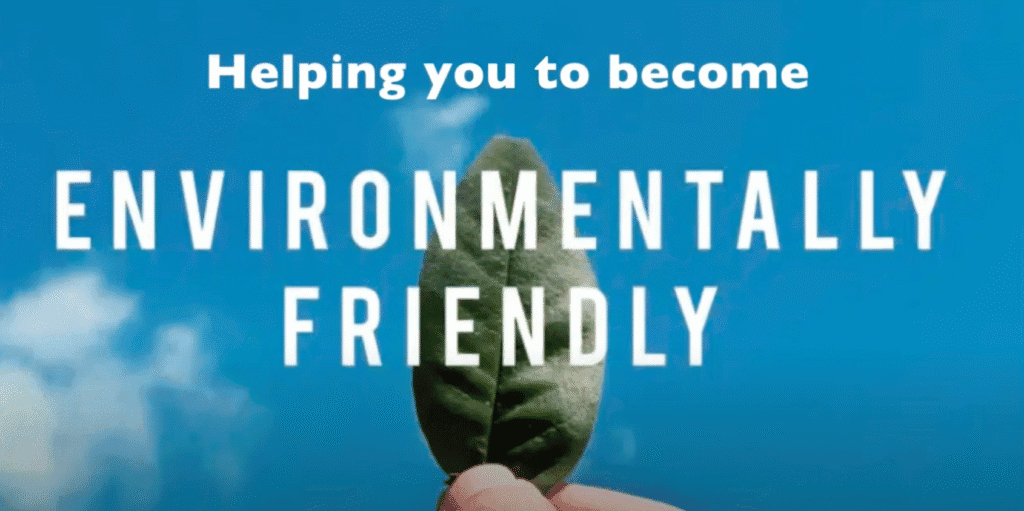 Holding a leaf to a blue sky demonstrating friendliness to the environment